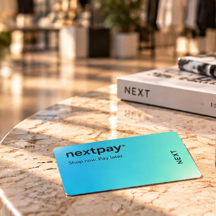 NextPay card on a marble table