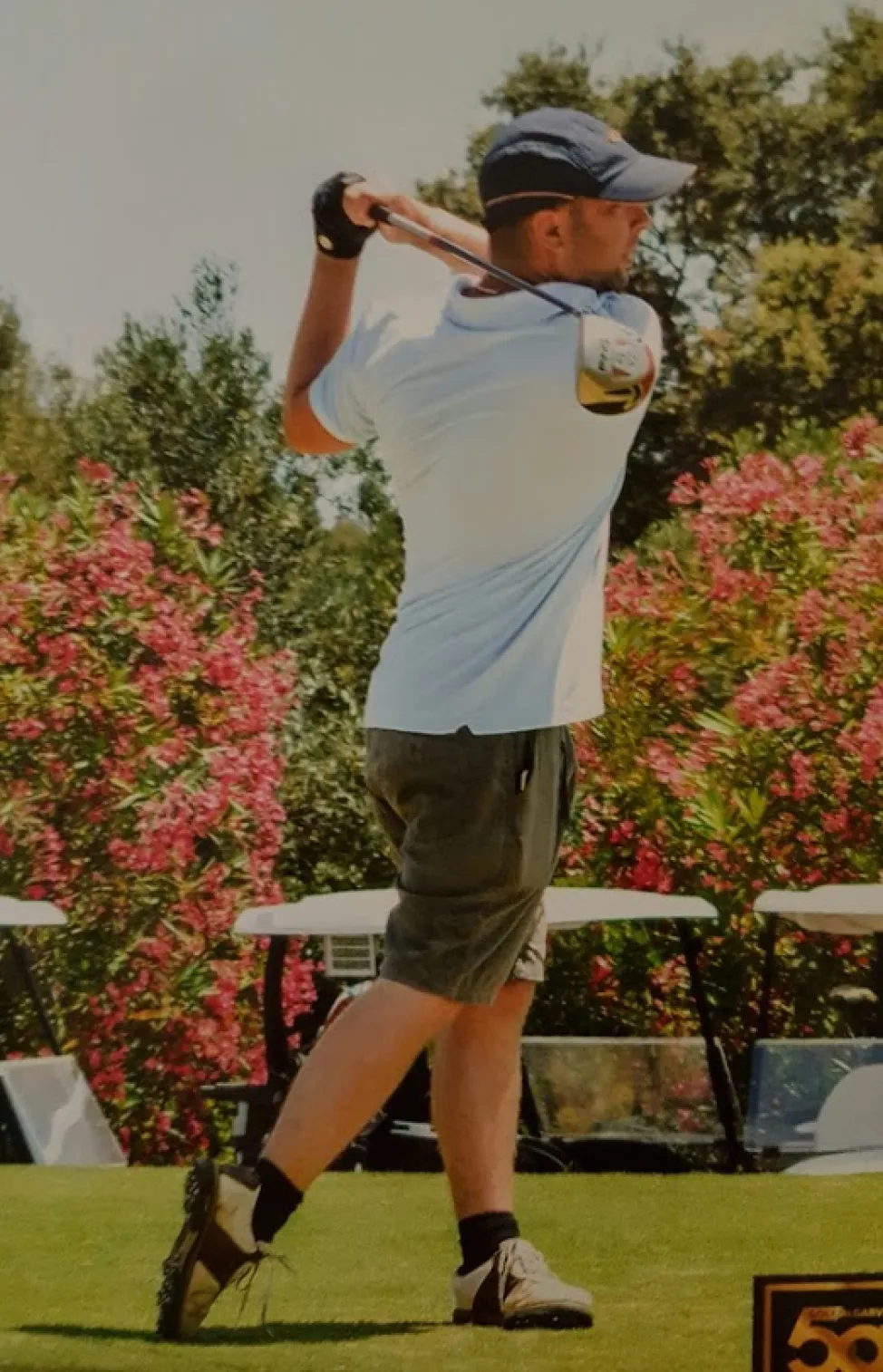 Michael Featherby golfing